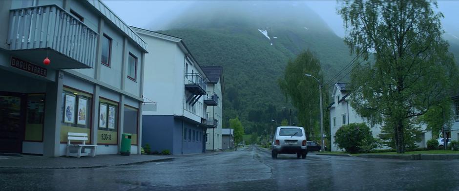 Natasha drives off towards the mountains.