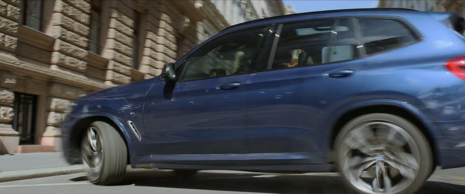 Natasha spins the car back around after Yelena's trick worked to get rid of the pursuing Widow.