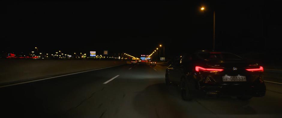 Natasha and Yelena speed down the highway in their new stolen car.