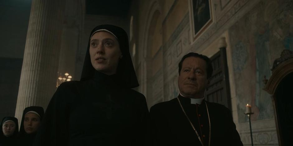 Sister Crimson tells Mother Superion that she has come to pay her respects after entering with Cardinal Duretti.