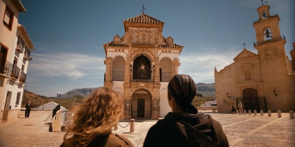 Ava and Mary look up at the local chruch.