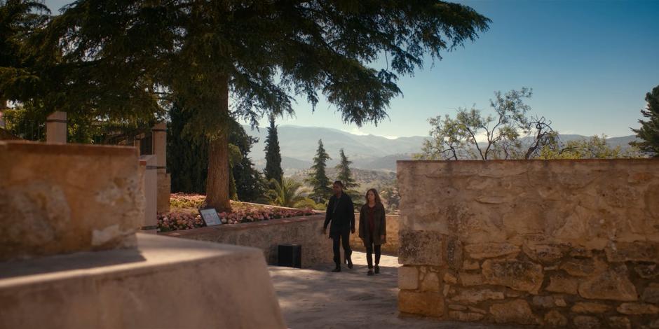 Mary leads Ava through the park towards the viewpoint.