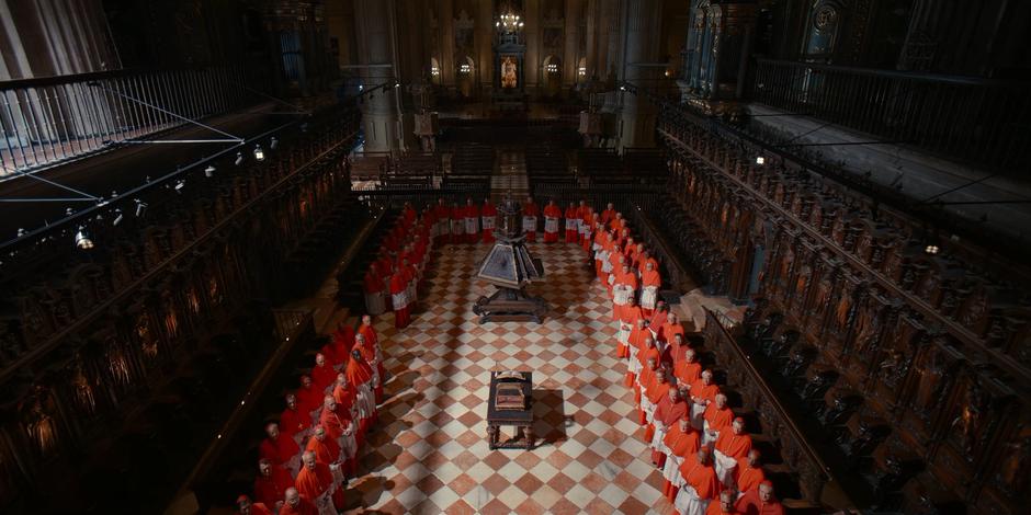 The College of Cardinals stand around as the election results are read.