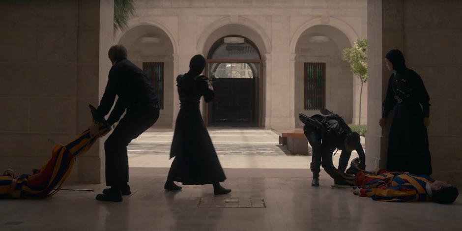 Father Vincent and Mary drag the unconcious bodies to two guards away as Camila and Beatrice keep an eye on the courtyard.