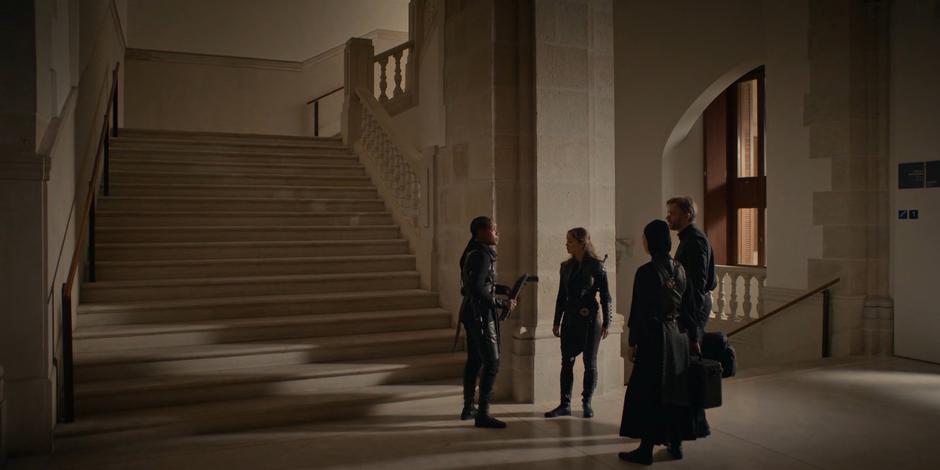 Mary prepares to split up with Ava, Beatrice, and Father Vincent at the stairs.