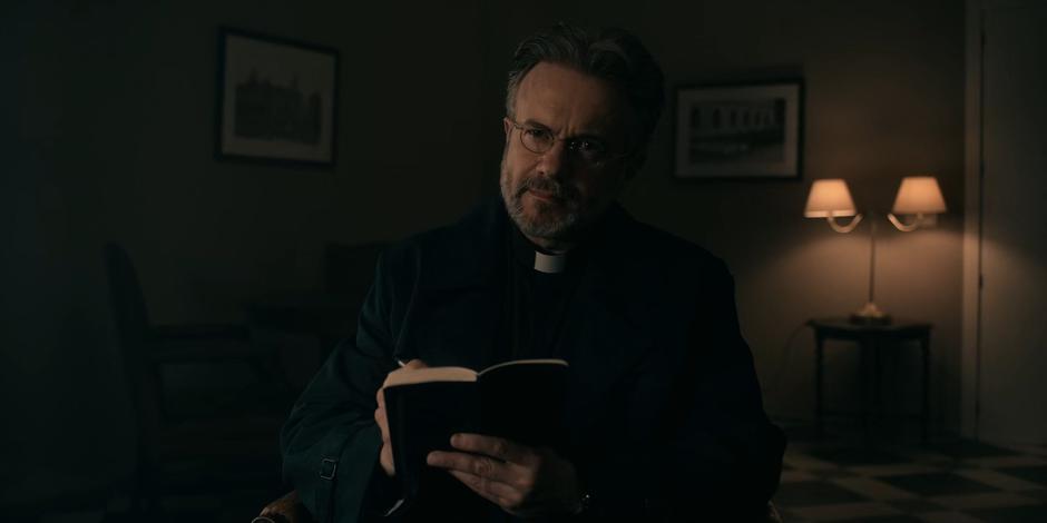 Father Vincent makes notes about Ava.