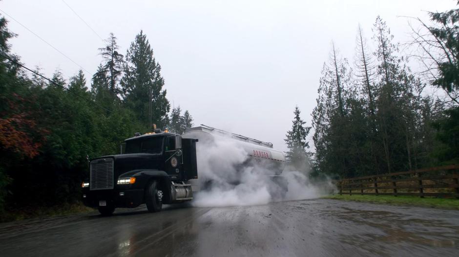 The truck slides to a stop amongst the cloud of Kara's freeze breath.