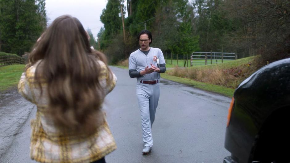 Brainy walks up to Kara after she has stopped the truck.