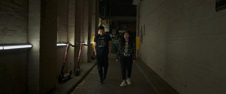 "Shaun" and Katy talk about their friends opinions of them as they walk down the alley.