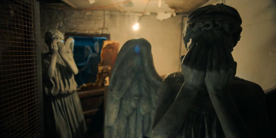 Several Weeping Angels burst in through the back door.