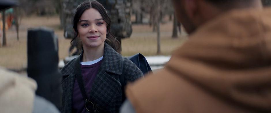 Kate smiles as she fist-bumps several of the LARPers.