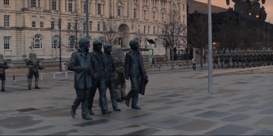 Sontarans patrol the plaza outside the museum.