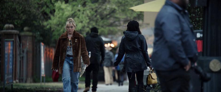 Yelena follows Eleanor in her casual outfit.