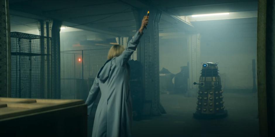 The Doctor uses her sonic to turn off the lights as a Dalek approaches her.