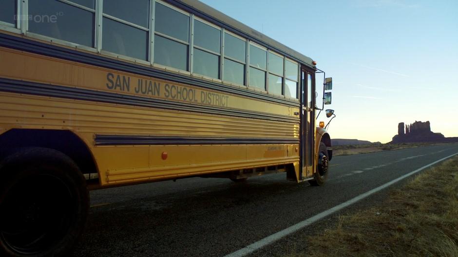 Amy and Rory get dropped off by a school bus.