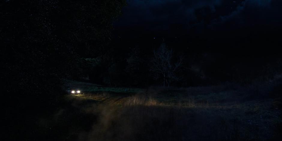 Steve drives the car up the steep hill with Robin, Dustin, and Erica at night.