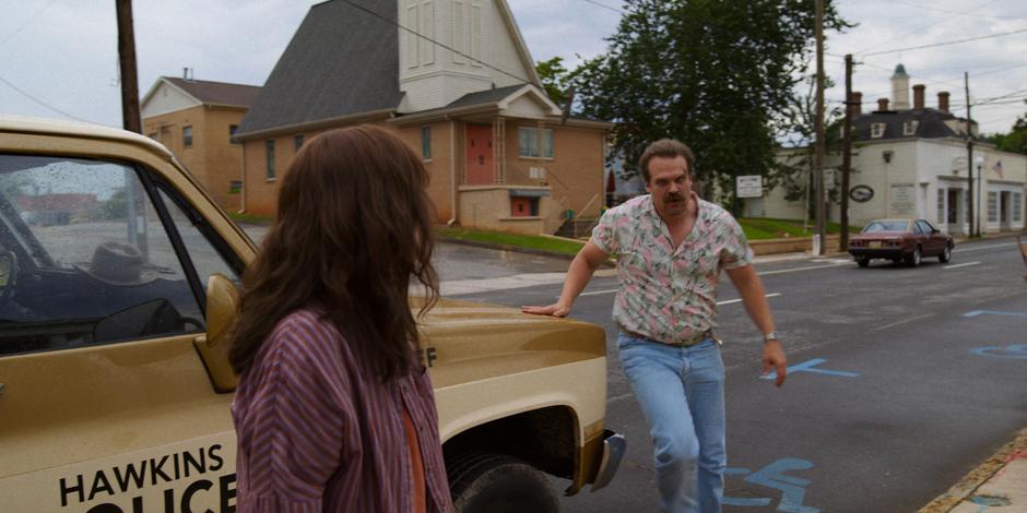 Joyce and Hopper get out of the truck and head to town hall to question the mayor.