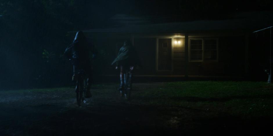 Lucas and Mike ride their bikes towards Will's house.