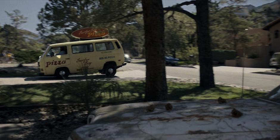 Argyle pulls his pizza delivery van into the driveway.