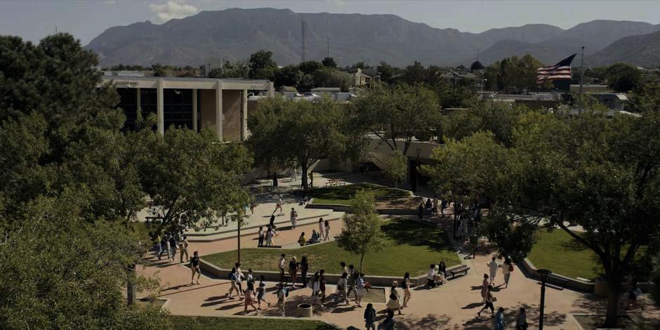 Students wander around in the plaza at the center of the school.