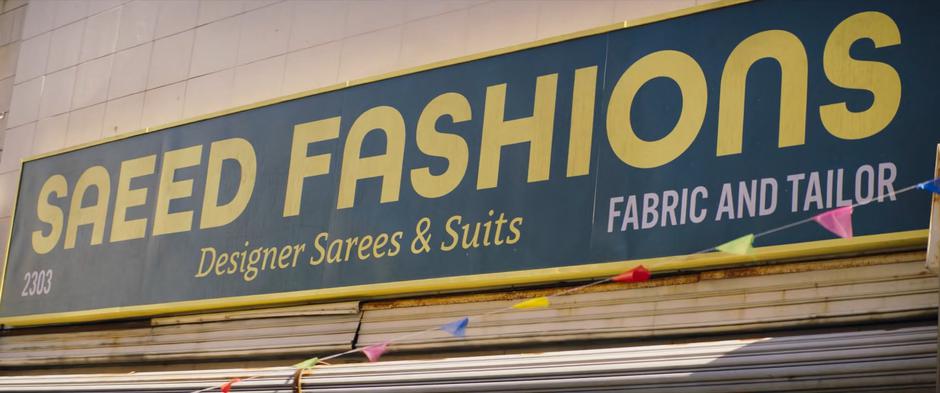 Establishing shot of the Saeed Fashions sign.