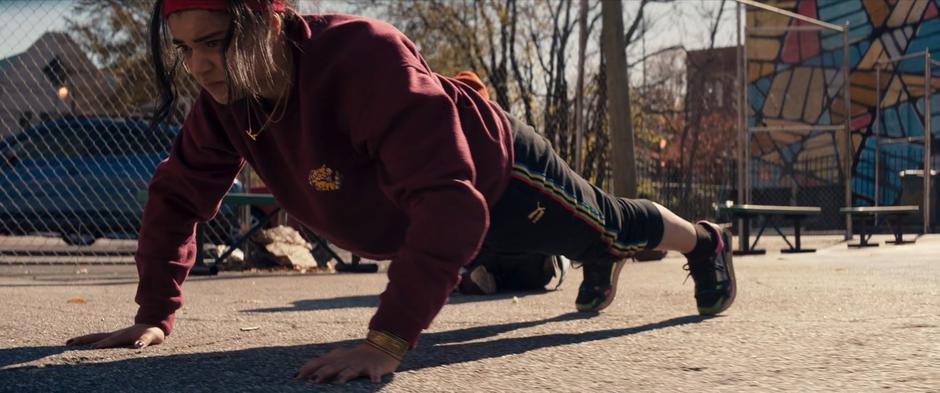 Kamala does some pushups during training.