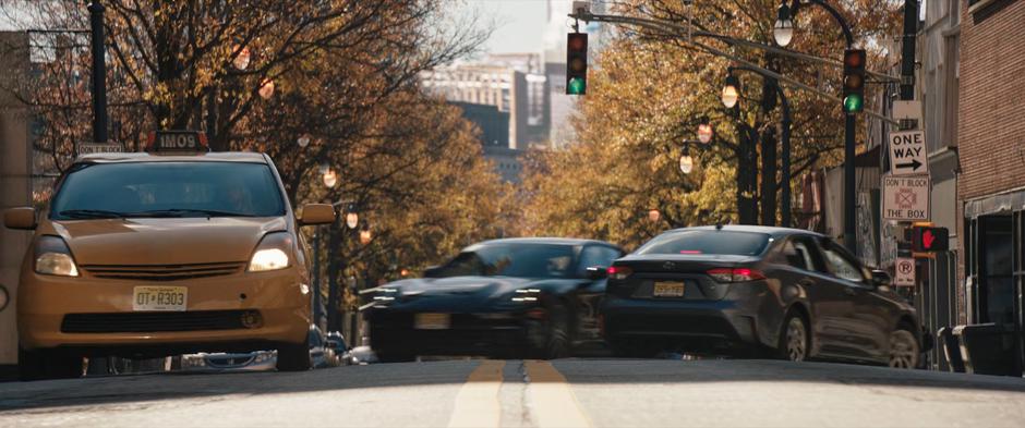 Kamala swerves back into her lane as she turns onto the street in Kamran's car.