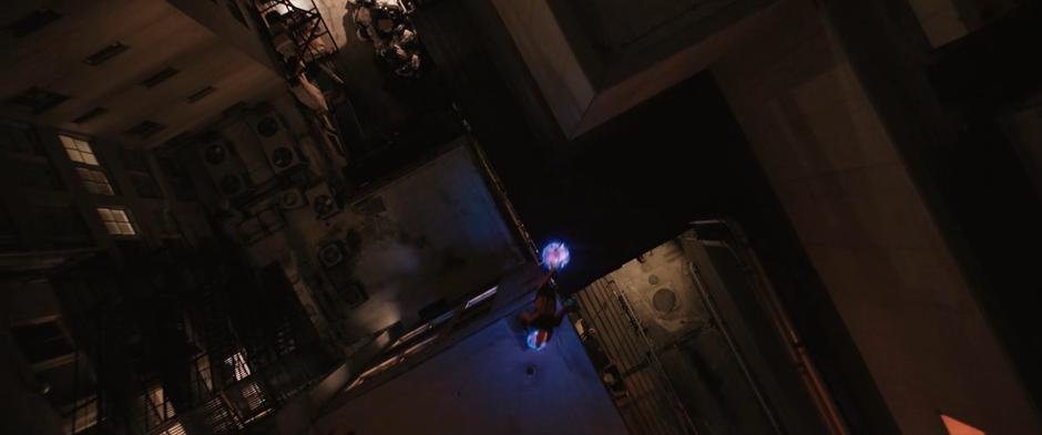 Kamala uses her light platforms to cross over a narrow alley.