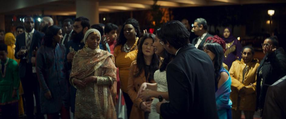 Tyesha comforts another bride who was celebrating her wedding in another room.