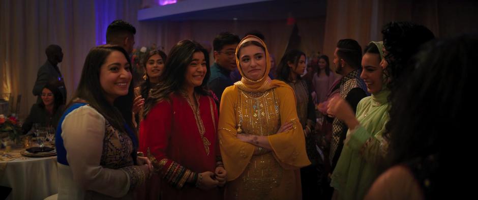 Kamala laughs with some others at the reception.