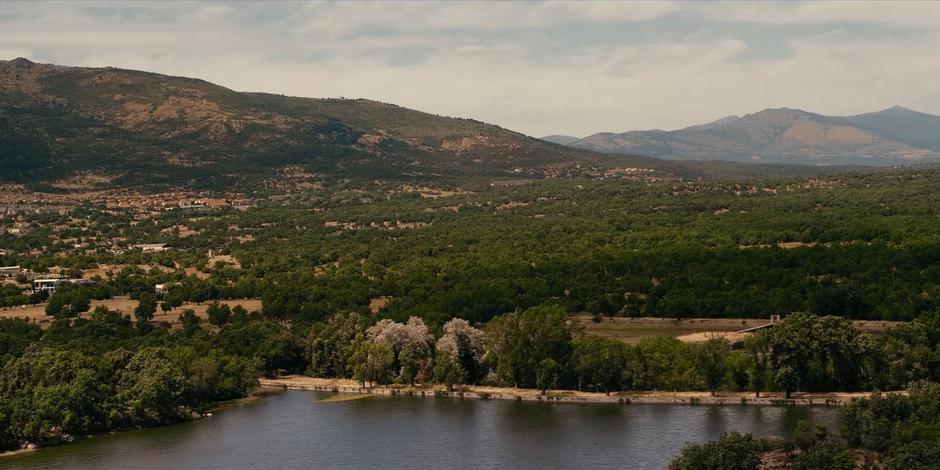 Aerial shot of the lake nestled amongst the mountains.