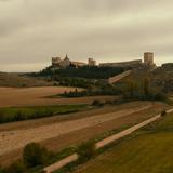 The monestery that houses the new OCS headquarters rises over the countryside.