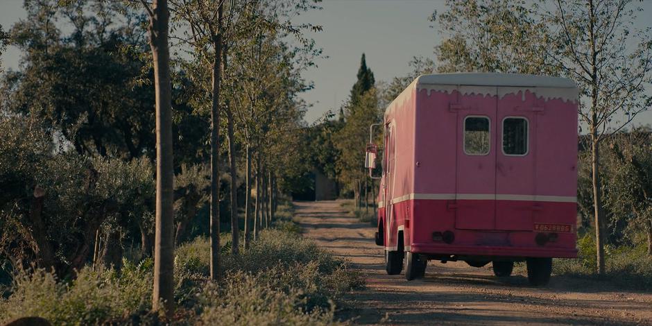 The bright pink van drives up the road to Jillian's home.