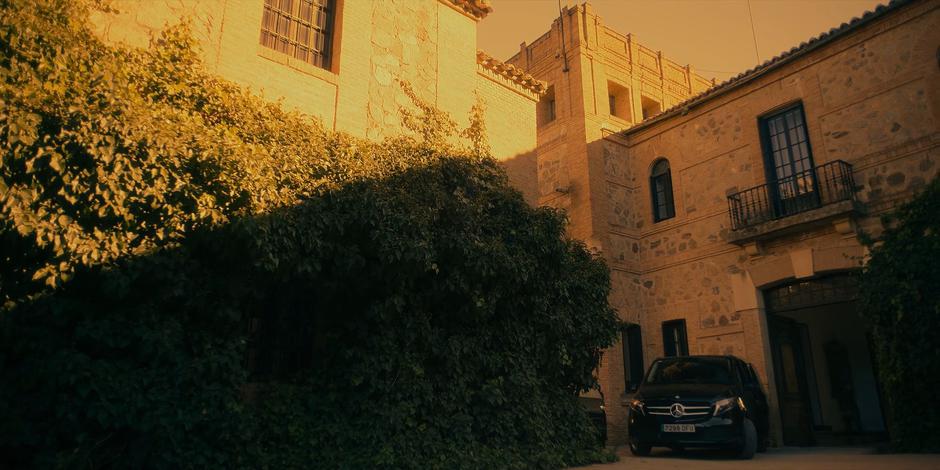 The van sits in the shade as the crew prepares for the mission.