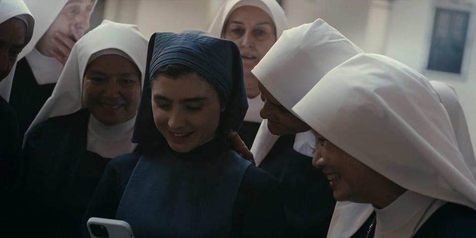 Camila remembers a nun touching her neck while she was showing them TikTok.