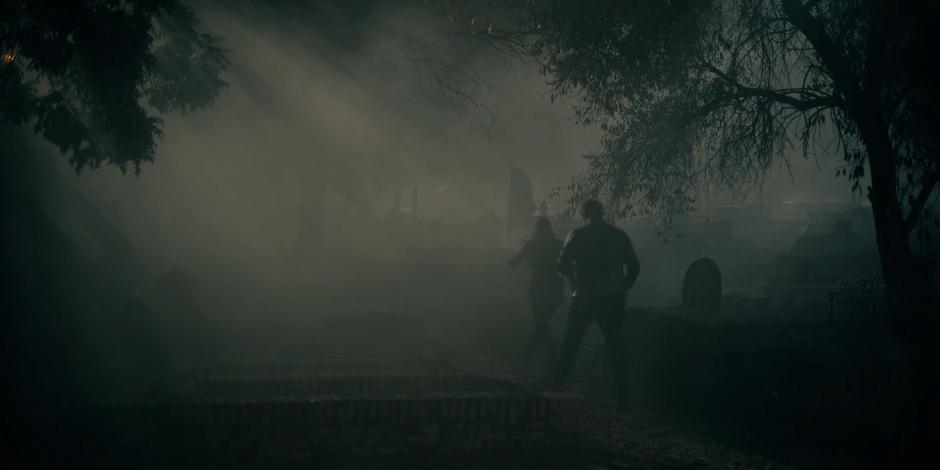 Ava and Miguel head off into the cemetery.