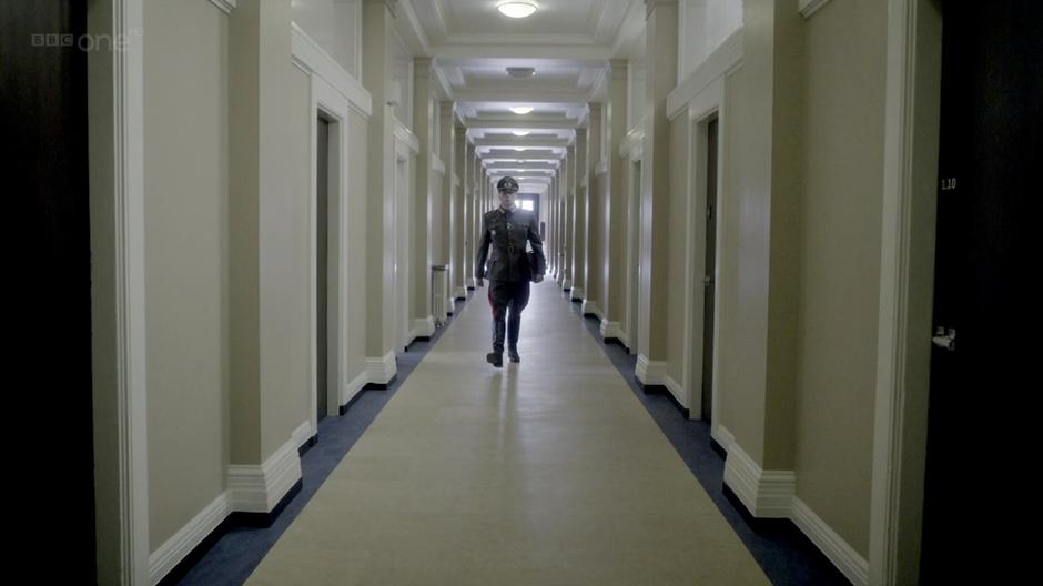 Erich Zimmerman walks down the corridor.