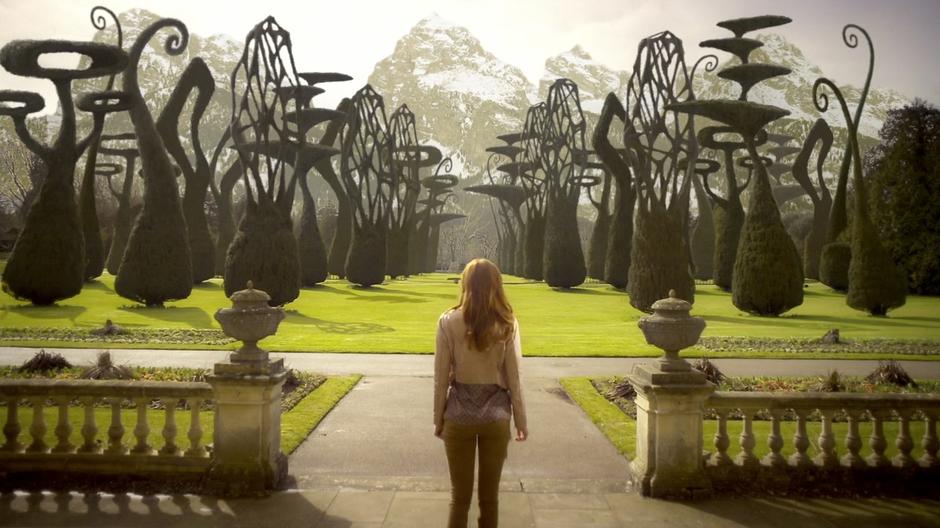 Amy enters the expansive gardens for the first time.