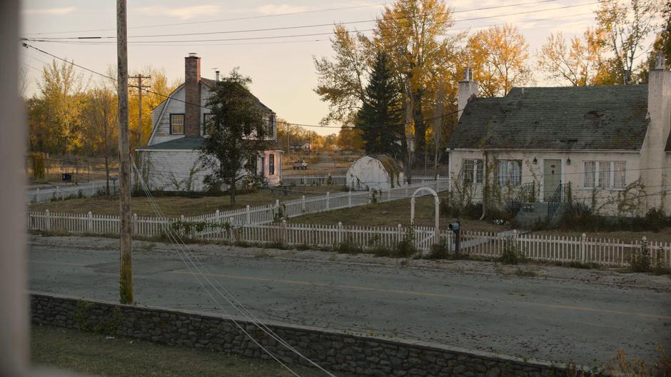 Joel and Ellie are visible driving off through the window of Bill & Frank's bedroom.