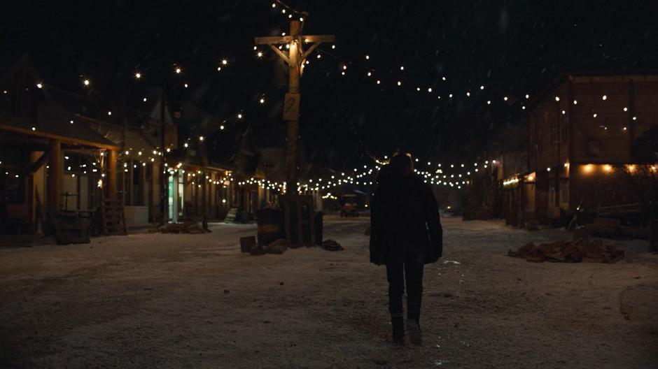 Ellie wanders down the otherwise deserted Main Street during movie night.