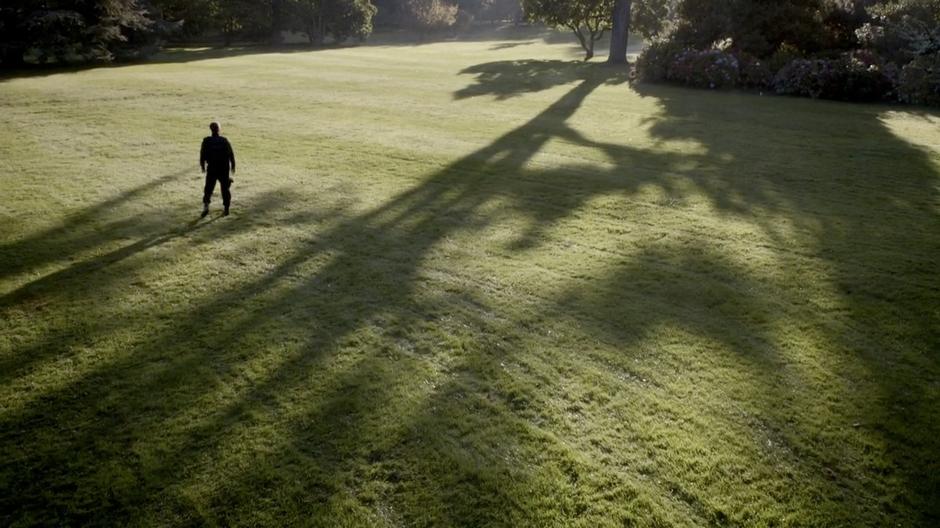 The spaceship guard thinks he is in the middle of a field.