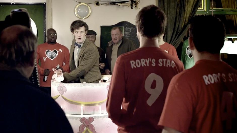 The Doctor talks to Rory after popping out of the cake.