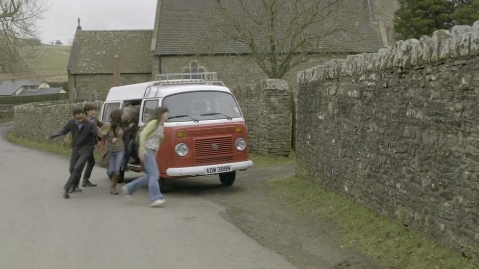 The Doctor lets off the folks he rescued.