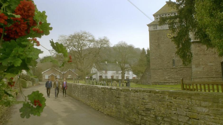 Amy and Rory show the Doctor through Upper Leadworth.