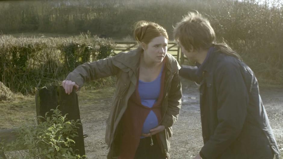 Rory talks to Amy outside their house.