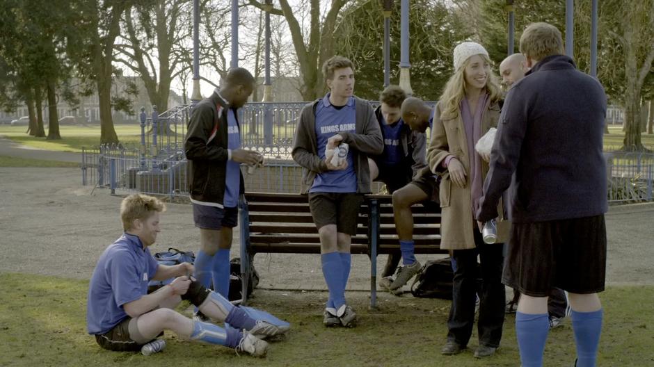 Craig and Sophie talk while the team hangs out after the game.