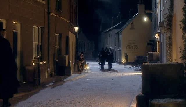 Gabriel Sneed and Gwyneth ride down the street in search for Mrs. Peace.