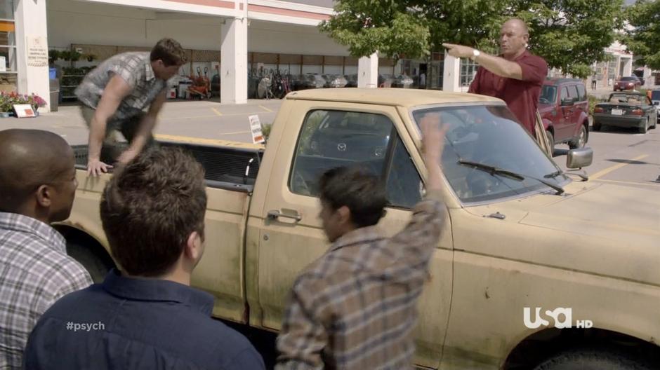 Henry recruits some day laborers from his pickup in front of Shawn and Gus.