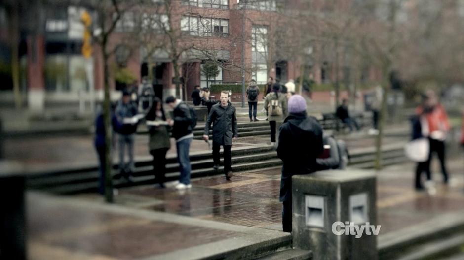 Nick Lane walks across the quad towards the location of the new earthquake.