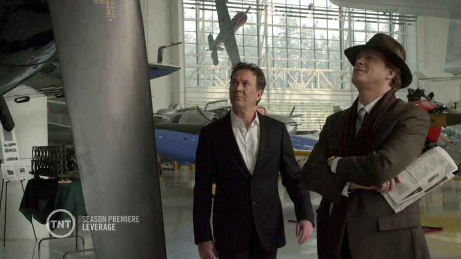 Nate and Scott Roemer admire and airplane in the museum.